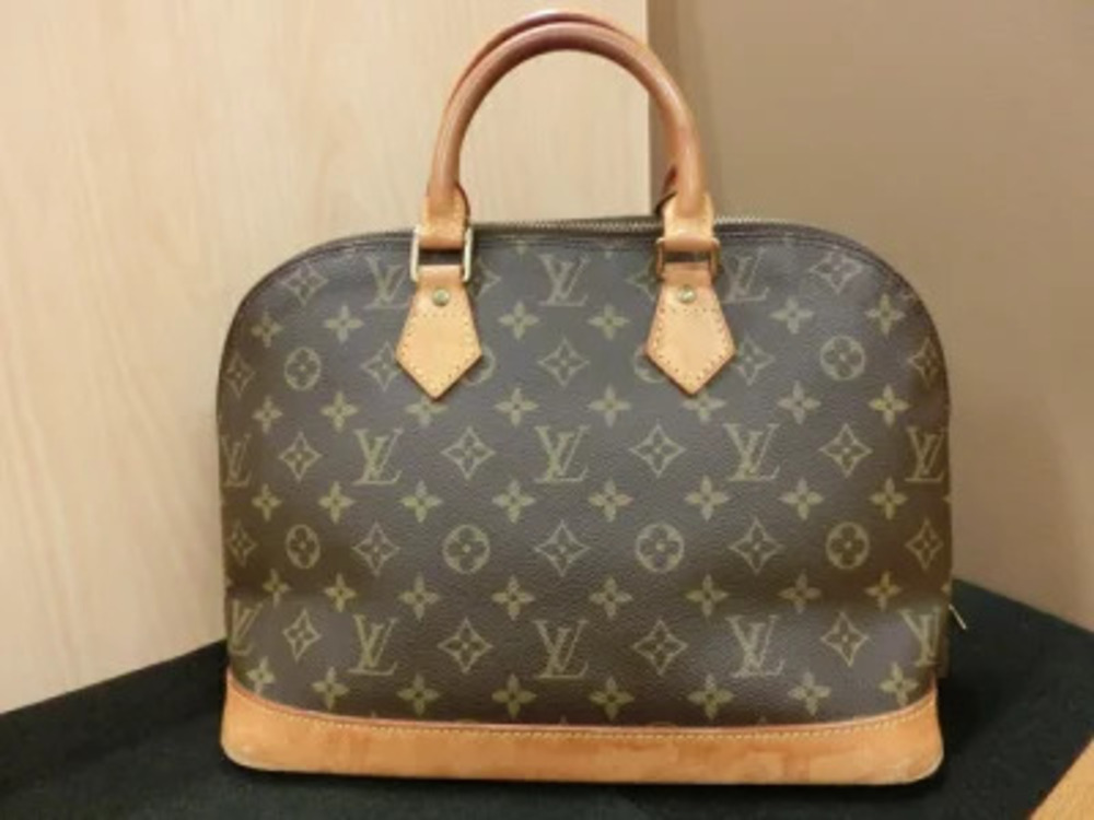 Louis Vuitton Alma Monogram Handbag